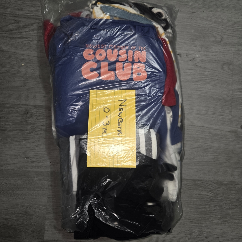 Bundle Of Newborn Clothes